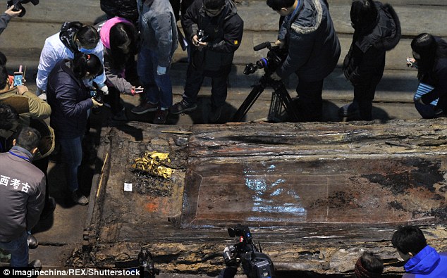 Gold plates and coins among valuable haul unearthed by archaeologists at 2,000-year-old royal tombs in China 