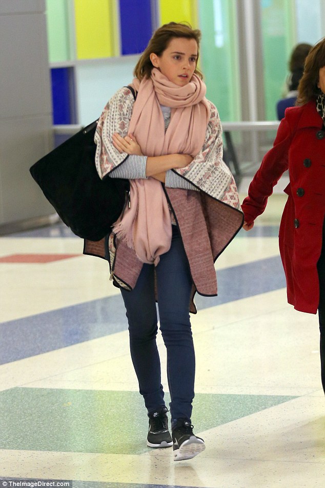 Taking it in her stride: The Harry Potter star was dressed for comfort as she made her way through the airport in a casual, layered ensemble