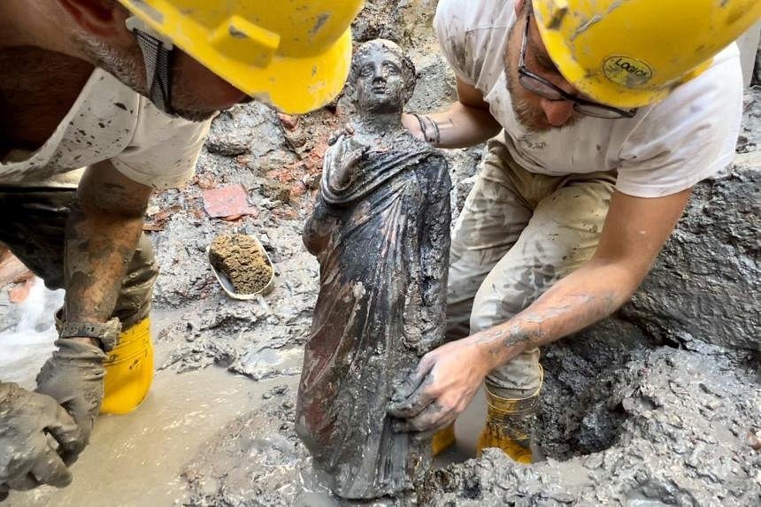 Archaeologists find 24 stunning ancient bronze statues, preserved in Tuscan spa