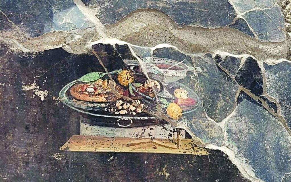Archaeologists discover a ‘Pizza’ painting in ancient Roman ruins of Pompeii Archaeologists discover a ‘Pizza’ painting in ancient Roman ruins of Pompeii