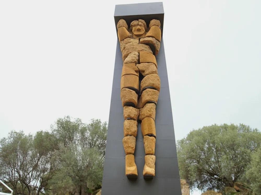 Restored Atlas statue from fifth century BCE raised in Sicily