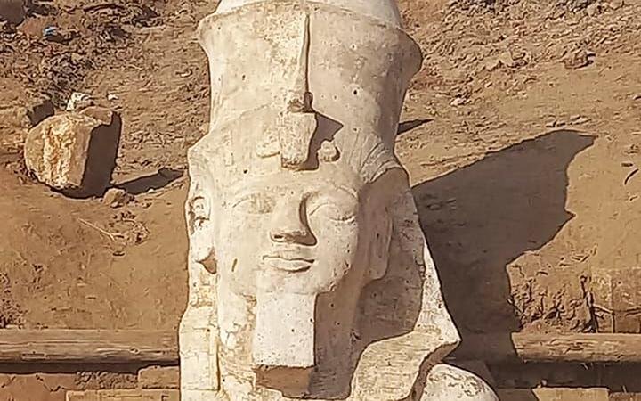 Archaeologists uncover upper section of colossal statue of Ramses II in Egypt