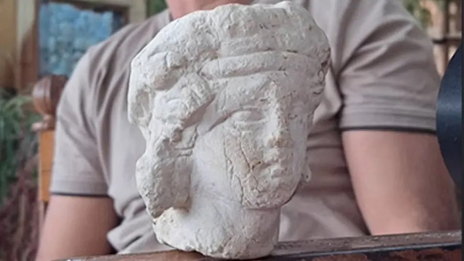 Head of a missing statue of Bacchus found near the ancient city of Cyrene in Libya