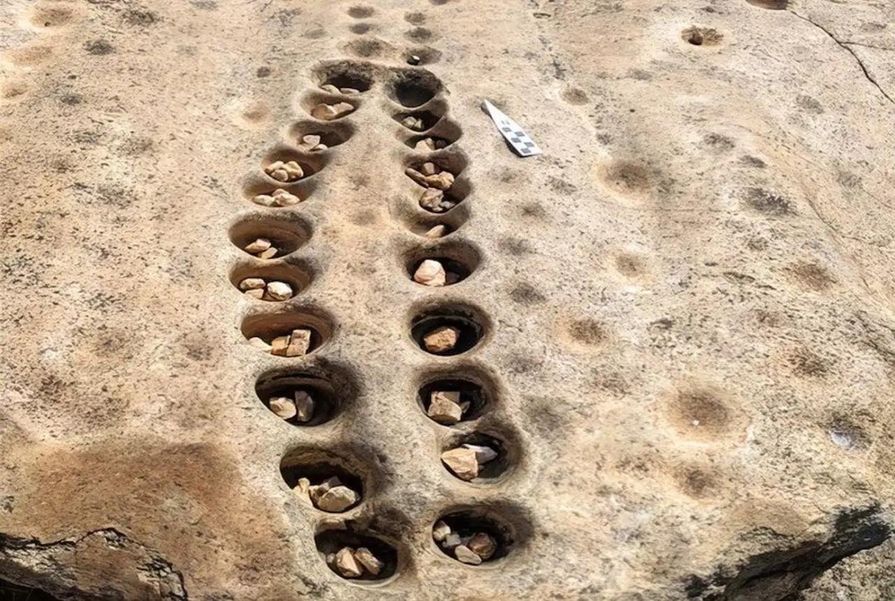 “Arcade” of ancient mancala game boards carved on rocks found in Kenya’s highlands