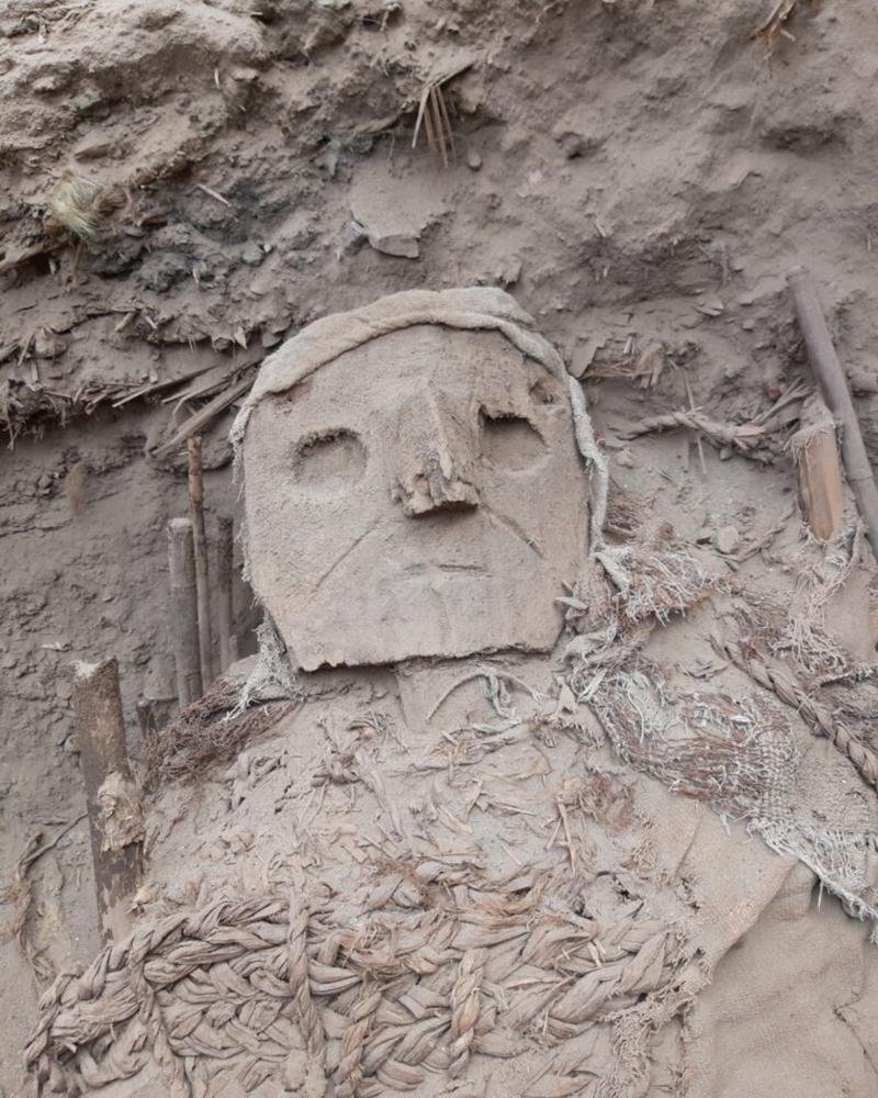 Seventy-three intact Wari mummy bundles with carved masks discovered at Pachacámac, Peru