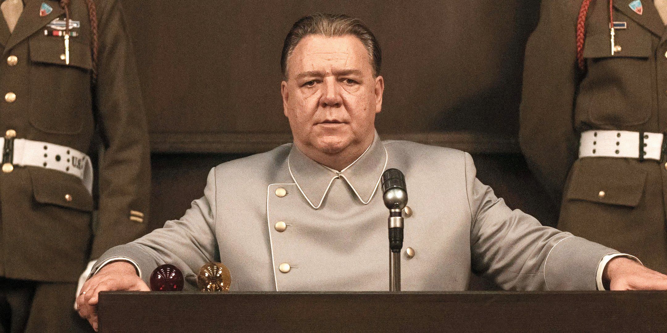 Russell Crowe’s Powerful Nazi Commander Is On Trial In The First Trailer For Post-WW2 Courtroom Drama