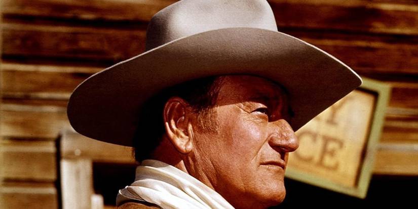 John Wayne’s Funniest “Cameo” Has Become A Little-Known Treasure Of ’90s Cinema